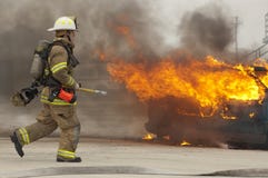 Firefighter in action royalty free stock photo Firefighter in action royalty free stock photo