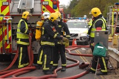 Firefighters at an incident stock photo Firefighters at an incident stock photo