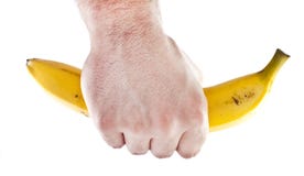 Firm Grip On A Banana Stock Photo Firm Grip On A Banana Stock Photo