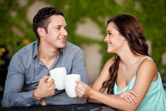 https://thumbs.dreamstime.com/t/first-date-coffee-shop-pretty-young-couple-having-fun-their-33777900.jpg