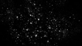 First falling snow bokeh texture on black background. Winter texture.Design element stock image First falling snow bokeh texture on black background. Winter texture.Design element stock image
