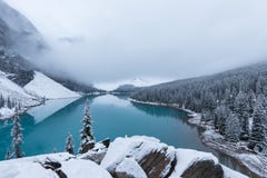 First Snow, Morning At Moraine Lake In Banff National Park Alberta Canada Snow-covered Winter Mountain Lake In A Winter Atmosphere Stock Photos