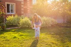 First steps of little adorable toddler boy, Happy and cute baby learning to walk with mother, mother`s day concept royalty free stock photos First steps of little adorable toddler boy, Happy and cute baby learning to walk with mother, mother`s day concept royalty free stock photos