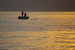 Fishermen on a boat at the sea royalty free stock photo Fishermen on a boat at the sea royalty free stock photo