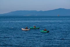 Fishermen on inflatable boats stock photo Fishermen on inflatable boats stock photo