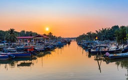Fishing boat park along the river estuary at the fishing village stock photo Fishing boat park along the river estuary at the fishing village stock photo