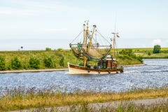fishing boats returning from their tour to bernersiel, north sea