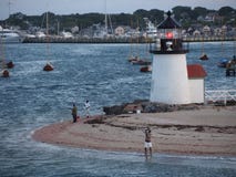Fishing By the Brant Point Light Royalty Free Stock Images Fishing By the Brant Point Light Royalty Free Stock Images