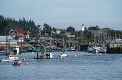 Fishing Harbour With Lighthouse Stock Photo