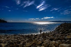 A Lonely Fisherman in the Mediterranean stock photography A Lonely Fisherman in the Mediterranean stock photography