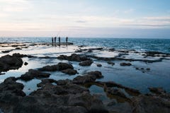 Fiskare fyra på havet royaltyfri foto Fiskare fyra på havet royaltyfri foto
