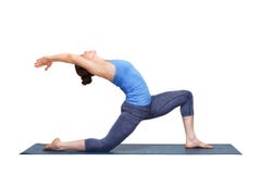 Fit yogini woman practices yoga asana Anjaneyasana stock photo Fit yogini woman practices yoga asana Anjaneyasana stock photo