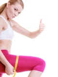 Fitness de vrouw die van de meisjessport haar dij meten stock afbeeldingen Fitness de vrouw die van de meisjessport haar dij meten stock afbeeldingen