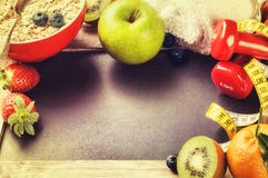 Fitness frame with dumbbells and fresh fruits. Healthy lifestyle Royalty Free Stock Photo Fitness frame with dumbbells and fresh fruits. Healthy lifestyle Royalty Free Stock Photo