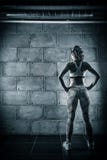 Fitness girl posing in the sport gym. Bodybuilding. Female stock image Fitness girl posing in the sport gym. Bodybuilding. Female stock image