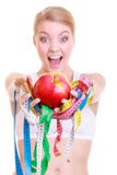 Fitness woman fit girl holding colorful measure tapes fruit stock images Fitness woman fit girl holding colorful measure tapes fruit stock images