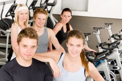 Fitness young group people at gym bicycle stock images Fitness young group people at gym bicycle stock images