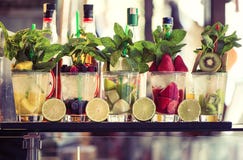 Five glasses of mojito with fruits. Fruit Alcoholic Cocktails royalty free stock photos Five glasses of mojito with fruits. Fruit Alcoholic Cocktails royalty free stock photos