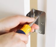 Fixing Door Hinge Royalty Free Stock Photo Fixing Door Hinge Royalty Free Stock Photo