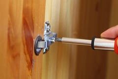 Fixing wardrobe door A stock photos Fixing wardrobe door A stock photos