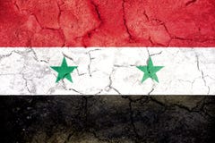 Flag of Syria painted on cracked ground royalty free stock photo Flag of Syria painted on cracked ground royalty free stock photo