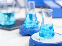 Flasks with blue liquid Stock Photo Flasks with blue liquid Stock Photo