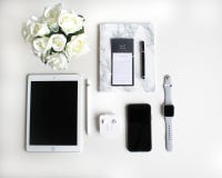 Flat lay: Apple products on black and white background stock image Flat lay: Apple products on black and white background stock image