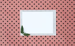 Flat, lay, background with white paper sheet for text and fern leaves, top view, polka dots background, natural color stock photos Flat, lay, background with white paper sheet for text and fern leaves, top view, polka dots background, natural color stock photos
