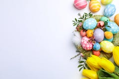 Flat lay composition with nest, Easter eggs, feathers and flowers on color background stock photos Flat lay composition with nest, Easter eggs, feathers and flowers on color background stock photos