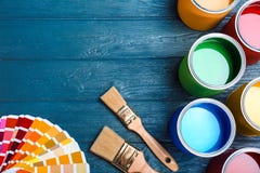 Flat lay composition with paint cans, brushes and color palette on wooden background royalty free stock photos Flat lay composition with paint cans, brushes and color palette on wooden background royalty free stock photos