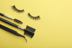 Flat lay composition of professional makeup tools and false eyelashes on color background stock photo Flat lay composition of professional makeup tools and false eyelashes on color background stock photo
