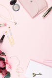 Flat Lay Home Office Desk. Female Workspace With Note Pad, Fashion Accessories And Make Up Products On Pink Background. Fashion Or Royalty Free Stock Photos Flat Lay Home Office Desk. Female Workspace With Note Pad, Fashion Accessories And Make Up Products On Pink Background. Fashion Or Royalty Free Stock Photos