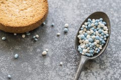 Vintage spoon with Dutch blue white aniseed balls. and rusk. Tradition in The Netherlands for when a boy is born stock images Vintage spoon with Dutch blue white aniseed balls. and rusk. Tradition in The Netherlands for when a boy is born stock images
