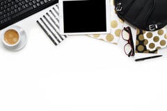 Flat lay photo of office white desk with tablet, keyboard and gold notebook copy space background royalty free stock image Flat lay photo of office white desk with tablet, keyboard and gold notebook copy space background royalty free stock image