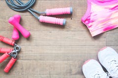 Flat lay of sport equipments and accessories for woman on wood background, Beauty and Healthy royalty free stock image Flat lay of sport equipments and accessories for woman on wood background, Beauty and Healthy royalty free stock image