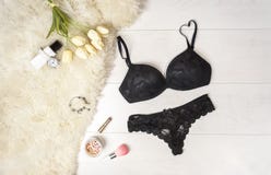Flat Lay Stylish Black Lingerie Accessories And White Tulips On A White Background. Valentine`s Day 8 March Party Outfit Royalty Free Stock Image