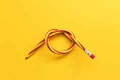 Flexible pencil . Isolated on yellow background royalty free stock images Flexible pencil . Isolated on yellow background royalty free stock images