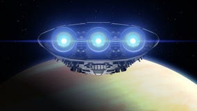 Alien spaceship is approaching Venus. Bright engines flashing, 3d animation. Texture of the Planet was created in the