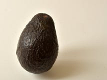 Floating ripe Avocado on white background. royalty free stock image Floating ripe Avocado on white background. royalty free stock image