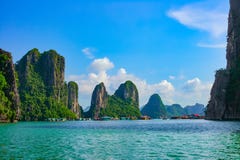 Floating village near rock islands in Halong Bay stock image Floating village near rock islands in Halong Bay stock image