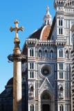 FLORENCE, ITALY - NOVEMBER, 2015: Ancient cross in front of the cathedral of Santa Maria in Fiore stock photo FLORENCE, ITALY - NOVEMBER, 2015: Ancient cross in front of the cathedral of Santa Maria in Fiore stock photo