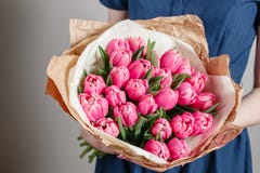 Florist Girl With Peony Flowers Or Pink Tulips Young Woman Flower Bouquet For Birthday Mother S Day. Royalty Free Stock Photos
