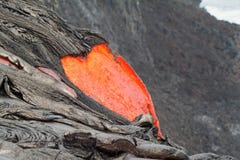 Flow Of Red Hot Lava Into Pacific Ocean Stock Photo