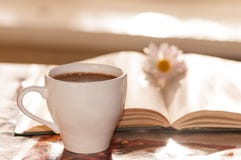 Flower On The Book, The Cup Of Black Coffee Royalty Free Stock Photo