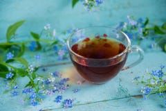Flower Tea And A Bouquet Of Forget-me-nots On A Wooden Background Stock Image Flower Tea And A Bouquet Of Forget-me-nots On A Wooden Background Stock Image