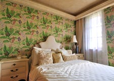 Flowery Bedroom In Morning Lighting Royalty Free Stock Photos