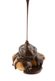 Flowing Down Chocolate On Profiteroles Royalty Free Stock Image