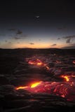 Fluxo de lava após o por do sol foto de stock royalty free Fluxo de lava após o por do sol foto de stock royalty free