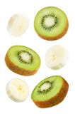 Flying banana slices with kiwi slices royalty free stock photo Flying banana slices with kiwi slices royalty free stock photo
