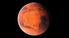Flying over the surface of the planet Mars, computer generated. 3d rendering of realistic cosmic background. Elements of